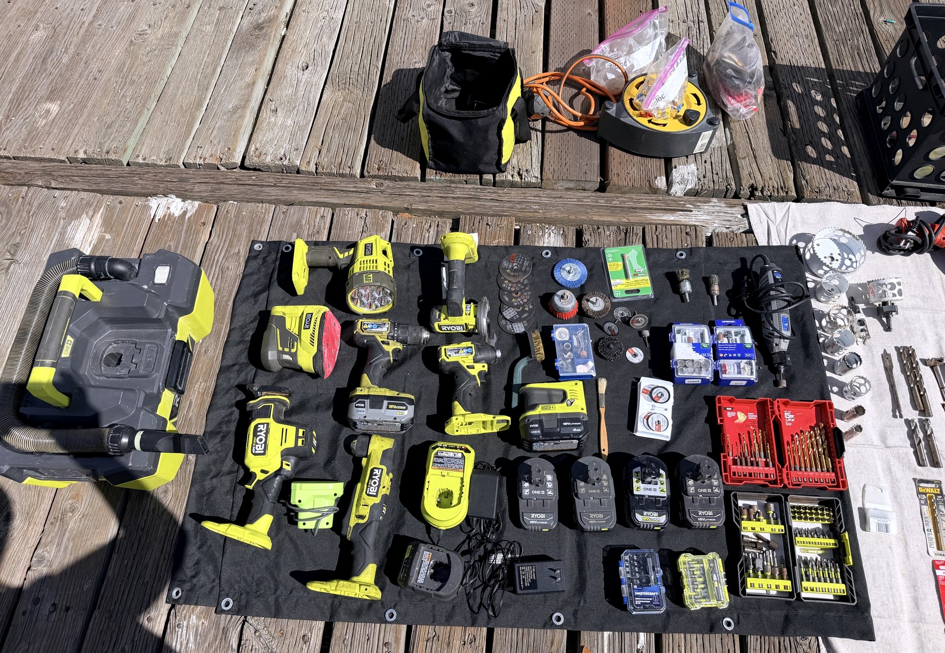 Power Tools (Ryobi ONE+ 18V / Dremel) laid out on deck